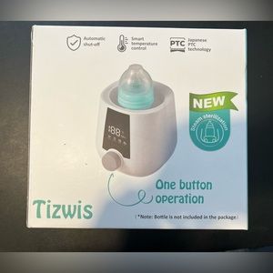 Tizwis japanese bottle warmer not used or opened before